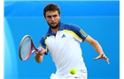 EASTBOURNE, ENGLAND - JUNE 22:  Gilles Simon of France in action during his men's singles final match against Feliciano Lopez of Spain on day eight of the AEGON International tennis tournament at Devonshire Park on June 22, 2013 in Eastbourne, England.  (Photo by Jan Kruger/Getty Images)